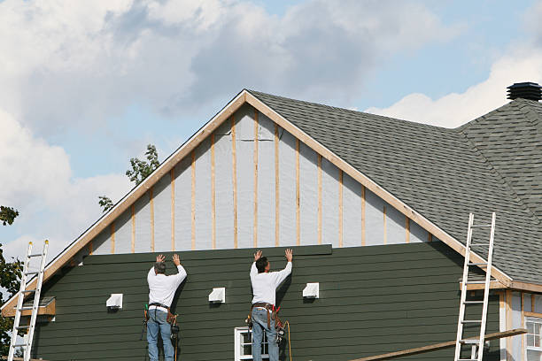 Professional Emergency Siding Repair technician working in Cuddy, PA